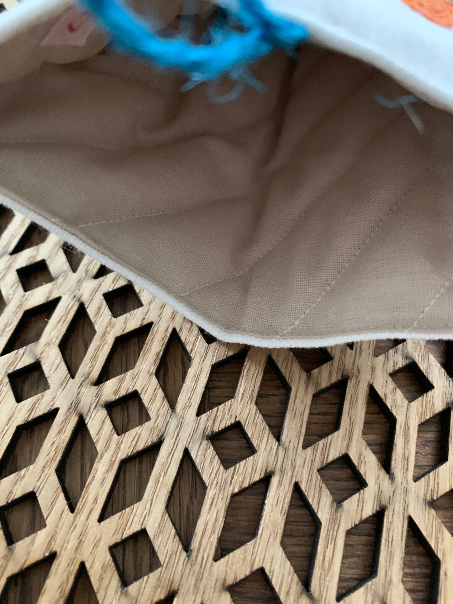Pochette matelassée jute bleue